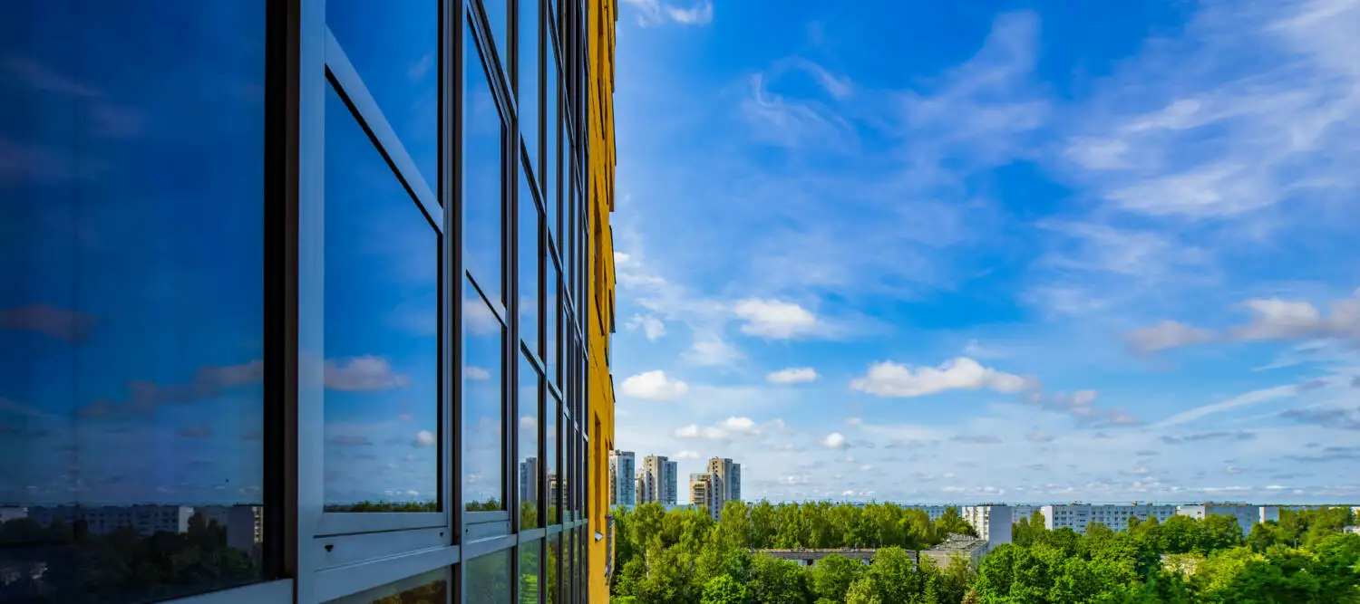 Top view of city and green trees_Medium.jpeg